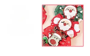 Détails des pinces à cheveux de Noël faites main avec motifs Père Noël et renne