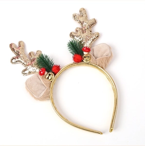 Detailed Christmas reindeer headband with gold sequins, plush ears, and festive bells