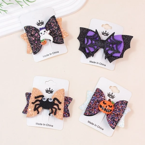 Set mit 4 Halloween-Haarspangen mit funkelnden Kürbis- und Gespenstermotiven