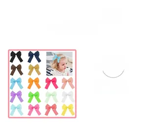 Set di 15 fermagli per capelli con fiocchi in nastro a coste con modella bambina