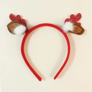 Close-up of red glitter reindeer antlers with soft white pom poms and felt ears