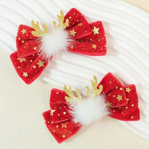 Zwei Weihnachts-Haarclips mit Rentiergeweih, roten Samtschleifen und Goldsternen