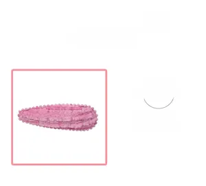 Detail of pink plush fabric hair clip featuring woven texture and wavy edge design