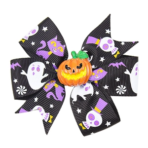 Halloween bow hair clip with ghost bat patterns and orange pumpkin center ornament