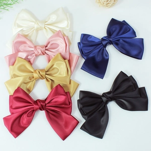 Elegant triple-layered satin bow hair clips in six classic colors with glossy finish