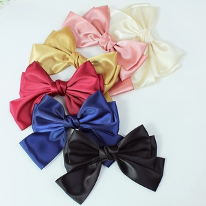 Set of 6 large multi-layer satin bow hair clips in pink, cream, gold, red, blue, and black