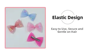 Detail of four colorful mesh lace bow hair clips with soft colorful pom-poms inside