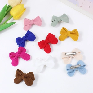 Set of ten colorful handmade fabric bow hair clips for girls with metal alligator clips