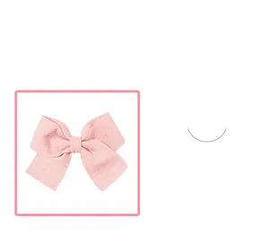 Détail du nœud en tissu rose doux avec texture tissée et finitions de qualité