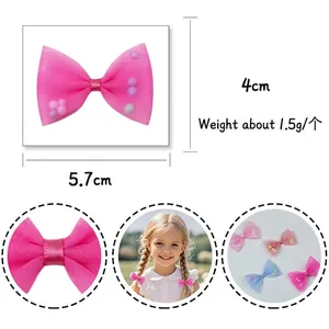 Pink mesh lace bow hair clip for girls decorated with colorful mini pom poms