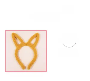 Close-up of soft plush yellow animal ear headband featuring comfortable furry fabric