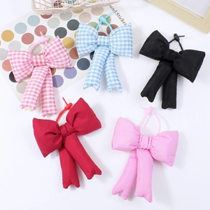 Cute quilted cotton bow charms in various colors with adjustable hanging straps for bags