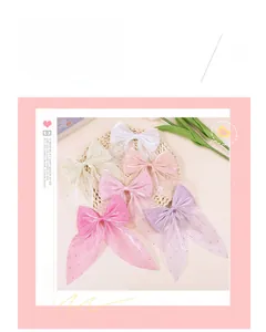 Detail of multi-color mesh bow accessories with sparkling rhinestones for hair and fashion