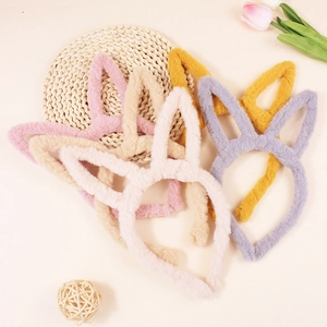 Cute plush bunny ear headbands in multiple pastel colors for women and children