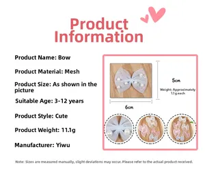 Detailed view of mesh bow hair accessory with pearls and sequins for kids DIY crafts