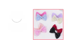 Close-up of multicolored rhinestone mesh bows with fine beads for DIY hair accessories