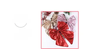 Close-up of glittery Christmas bow ornaments in red, gold, and pink festive colors