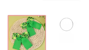 Detail of St. Patrick's Day hair clips with green clover pattern ribbon and long bows