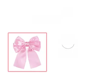Close-up of pink satin double-layered bow hair clip with elegant long ribbons for girls