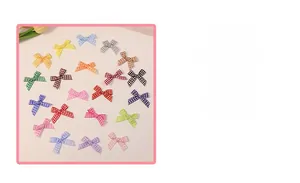 Detail view of colorful 2cm plaid bowknot accessories in various pastel gingham patterns
