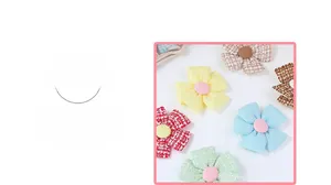 Close-up of handmade tweed fabric flowers with gold thread and central button detail