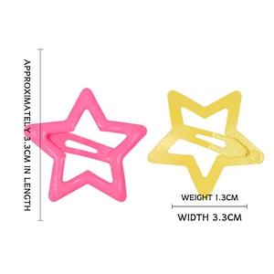Set of colorful star-shaped metal snap clips for girls in pink and yellow finishes