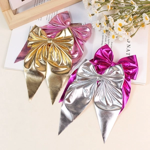 Elegant metallic bow hair clips set in gold, silver, pink colors with long ribbons