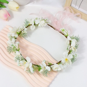 Floral princess headband with white silk flowers and long pink ribbons for girls