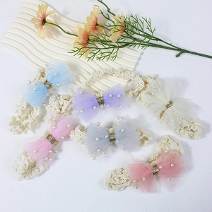 6-pack infant lace bow headbands with faux pearls and sequins on white background