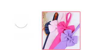 Detail showing various colors of grosgrain ribbon bows with fine ribbed texture