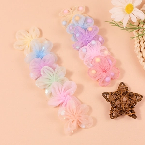 Handmade mesh gauze flower accessories with colorful pompoms and sparkling sequins