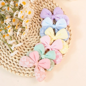 Set of 6 colorful floral polyester fabric bows in pastel colors for DIY hair accessories