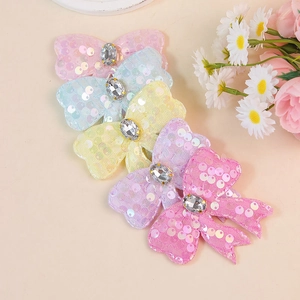Pinzas para el pelo de mariposa con lentejuelas y pedrería de cristal en tonos pastel