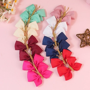 Handmade polyester grosgrain ribbon hair clips with gold thread details in various colors