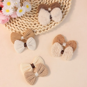 Earthy tone children's hair bow set with wool, knit, and waffle texture accessories