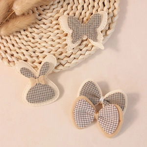 Handmade fabric accessories featuring hounds-check rabbit, butterfly and bowknot shapes