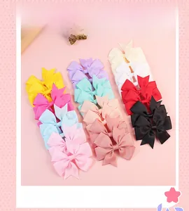 Detail showing various colorful grosgrain ribbon bows for hair accessories and decorations