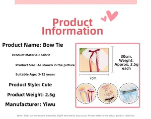 Detailed view of ballet style ribbon bow hair clip with 30cm long flowing streamers