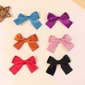 Set aus Samt-Stoffschleifen in sechs verschiedenen Farben für DIY-Haarschmuck und Deko
