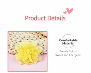 Detail of a 5cm yellow chiffon flower accessory with multilayered mesh petals