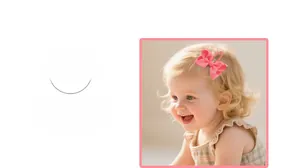 Detail view of a pink grosgrain ribbon bow hair clip worn by a young child