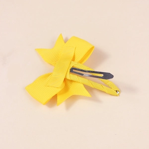 Bright yellow grosgrain ribbon bow hair clip with silver metal fastener for girls