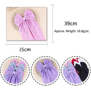 Barrette à nœud papillon en maille avec longs rubans en plusieurs couleurs unies