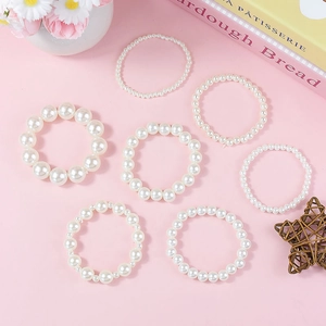 Elegant 7-piece white faux pearl elastic bracelet set for women with French vintage style