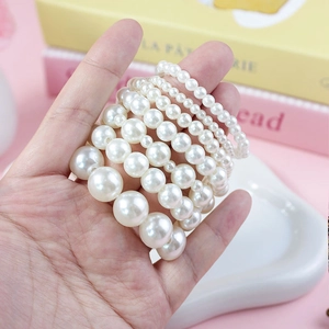 Elegant white faux pearl bracelets set in various sizes for French vintage style