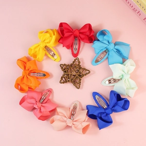 Set of 8 colorful grosgrain ribbon hair bows with clips for girls in bright shades