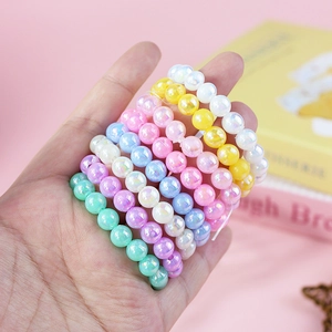 Set of colorful iridescent pearl beads bracelets for girls in sweet candy colors