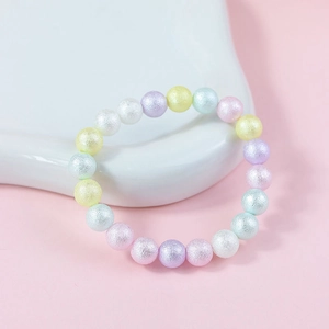 Close-up of cute 8mm frosted acrylic candy beads bracelet in macaron pastel colors