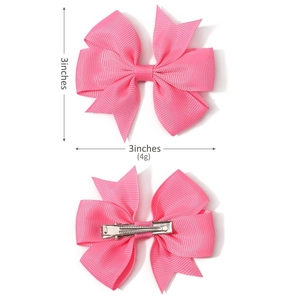 Front and back view of a 3-inch pink grosgrain ribbon hair bow with a metal alligator clip