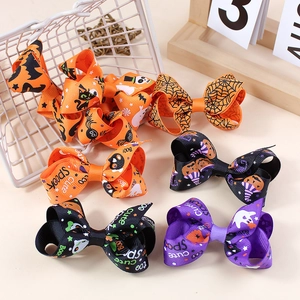 Halloween bow hair clips set with pumpkin and ghost patterns for kids festive accessories